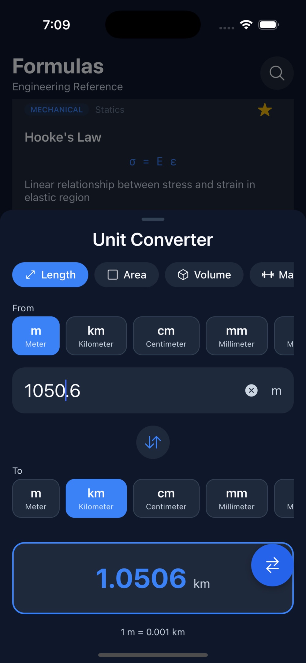 EngiRef's Unit Converter sliding up over the Hooke's Law formula card, set to the Length category, converting 1050.6 m into 1.0506 km, with unit chips for meter, kilometer, centimeter and millimeter in both the From and To rows.