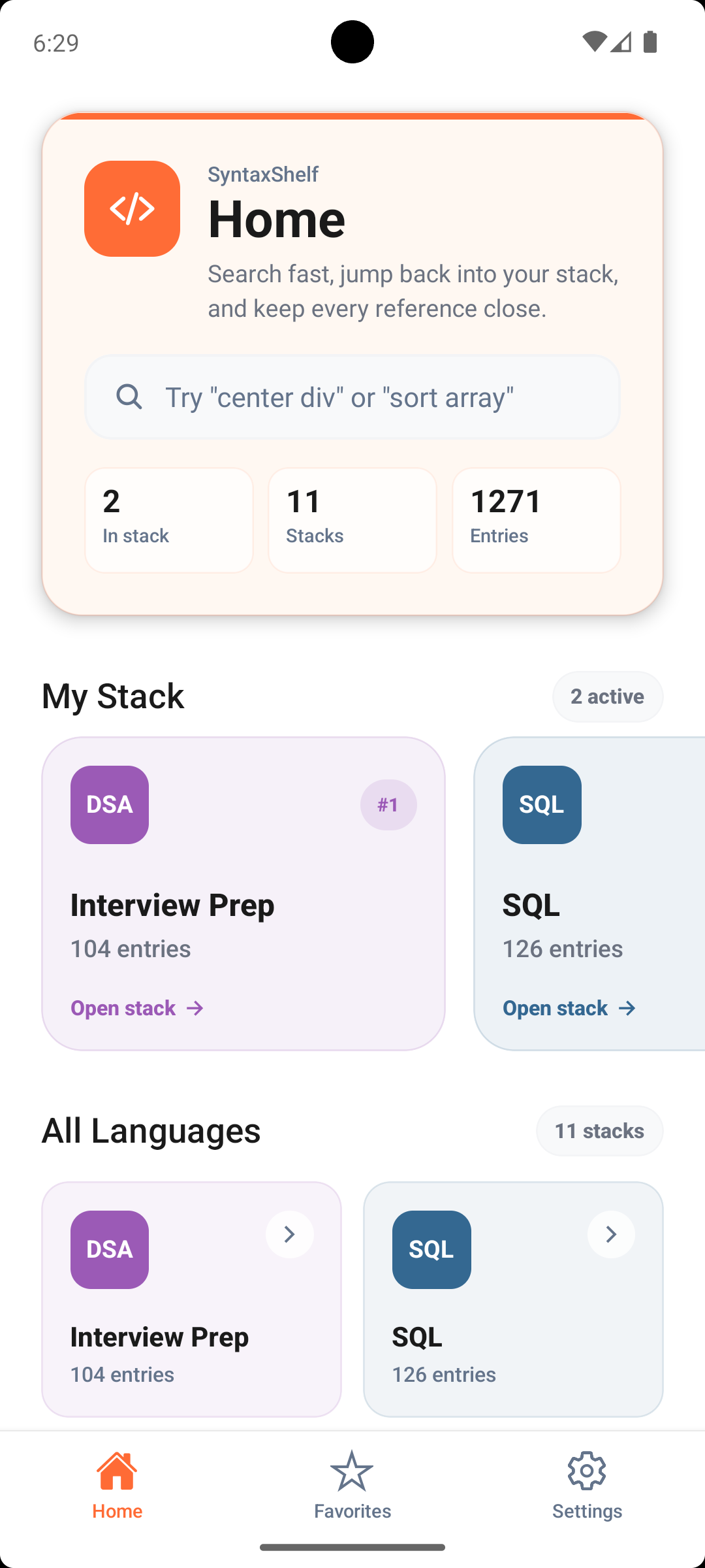 SyntaxShelf's home screen with a search box hinting "Try center div or sort array", counters for 2 in stack, 11 stacks and 1271 entries, a My Stack row with Interview Prep at 104 entries and SQL at 126, and an All Languages grid below.